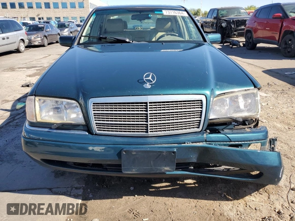 1997 Mercedes-Benz C with VIN WDBHA23EXVF507185, listed as a Copart auction lot 73716364 with 167,171 mi miles and Salvage title. Bid and sale history available at DreamBid. Image 5.