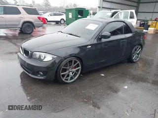 2012 BMW 1 Series 128i with VIN WBAUN1C51CVH84311, listed as a IAAI auction lot 41551912 with 147,052 mi miles and . Bid and sale history available at DreamBid. Image 2.