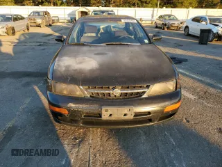 1998 Nissan Maxima GXE с VIN JN1CA21D6WT533634, выставлен на аукционе Copart как лот 83339404 с пробегом 180 356 миль миль и Списание • Salvage title. История ставок и продаж доступна на DreamBid. Изображение 5.