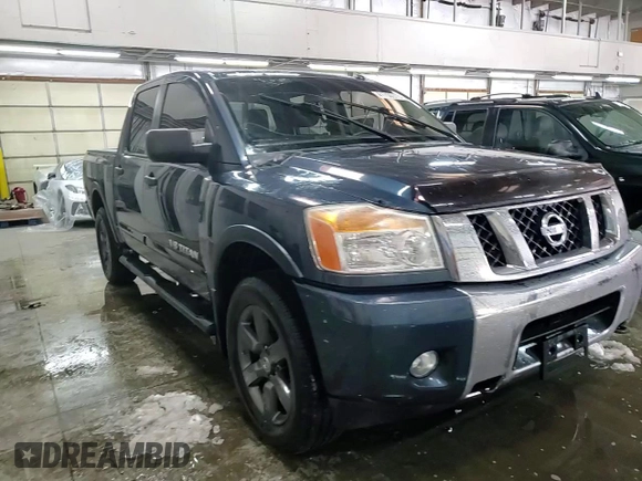 2015 Nissan Titan SL with VIN 1N6AA0EC1FN509625, listed as a Copart auction lot 41700575 with 100,327 mi miles and Salvage Title. Bid and sale history available at carsss.com. Image 13.