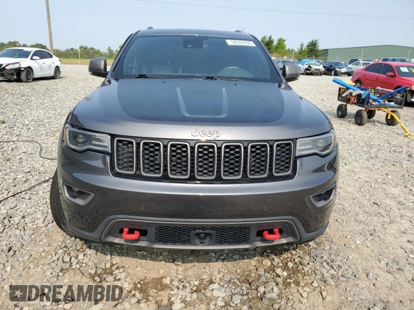 2017 Jeep Grand Cherokee Trailhawk with VIN 1C4RJFLT3HC614449, listed as a Copart auction lot 58559335 with 153,051 mi miles and Salvage title. Bid and sale history available at DreamBid. Image 5.