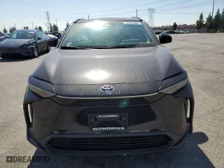 2023 Toyota bZ4X XLE with VIN JTMAAAAA9PA021173, listed as a Copart auction lot 73781034 with 51,882 mi miles and Salvage Title. Bid and sale history available at carsss.com. Image 5.