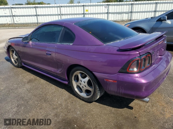 1997 Ford Mustang Cobra with VIN 1FALP47V0VF117976, listed as a Copart auction lot 72975454 with 165,076 mi miles and Salvage Title. Bid and sale history available at carsss.com. Image 2.