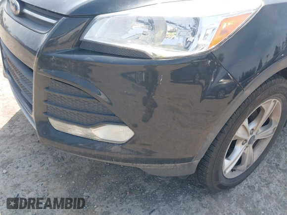 2013 Ford Escape SE z VIN 1FMCU0GX1DUD55435, wystawiony jako IAAI lot #42575683 z przebiegiem 205 271 mil mil oraz . Historia ofert i sprzedaży dostępna na DreamBid. Obrazek 6.