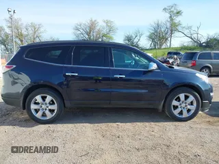 2016 Chevrolet Traverse LT z VIN 1GNKVGKD1GJ342152, wystawiony jako IAAI lot #42176937 z przebiegiem 76 739 mil mil oraz . Historia ofert i sprzedaży dostępna na DreamBid. Obrazek 13.