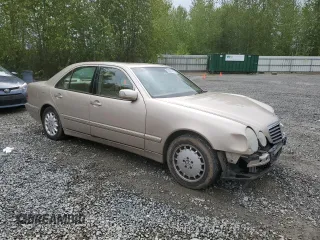 2001 Mercedes-Benz E-Class with VIN WDBJF65J51B378052, listed as a Copart auction lot 55057915 with 228,896 mi miles and Salvage Title. Bid and sale history available at carsss.com. Image 4.