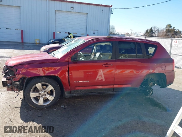2014 Jeep Compass High Altitude with VIN 1C4NJCEA3ED539489, listed as a IAAI auction lot 41653313 with 124,462 mi miles. Bid and sale history available at carsss.com. Image 14.