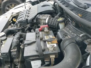 2014 Nissan Sentra S z VIN 3N1AB7APXEY256018, wystawiony jako IAAI lot #42603848 z przebiegiem 114 140 mil mil oraz . Historia ofert i sprzedaży dostępna na DreamBid. Obrazek 19.