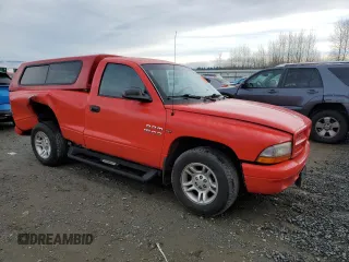 2001 Dodge Dakota with VIN 1B7FL26X01S233108, listed as a Copart auction lot 41419545 with 226,871 mi miles and Salvage Title. Bid and sale history available at carsss.com. Image 4.