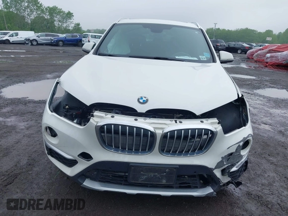 2018 BMW X1 xDrive28i with VIN WBXHT3C38J5L31322, listed as a IAAI auction lot 42260190 with 70,266 mi miles and . Bid and sale history available at DreamBid. Image 12.