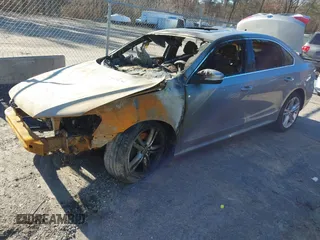 2014 Volkswagen Passat SE z VIN 1VWBN7A34EC039575, wystawiony jako IAAI lot #41234780 z przebiegiem Nie podano mil oraz . Historia ofert i sprzedaży dostępna na DreamBid. Obrazek 2.