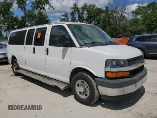 2017 Chevrolet Express Passenger LT with VIN 1GAZGPFG2H1180404, listed as a Copart auction lot 56962715 with 89,706 mi miles and Salvage title. Bid and sale history available at DreamBid. Image 4.