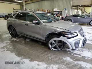 2022 Genesis GV70 Sport with VIN KMUMCDTC3NU012338, listed as a Copart auction lot 42691625 with 67,161 mi miles and Salvage title. Bid and sale history available at DreamBid. Image 4.