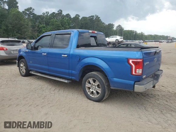 2015 Ford F-150 XL with VIN 1FTEW1CPXFKD77046, listed as a Copart auction lot 59692845 with 205,659 mi miles and Salvage title. Bid and sale history available at DreamBid. Image 2.