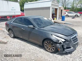 2014 Cadillac CTS Sedan RWD with VIN 1G6AP5SX2E0188411, listed as a IAAI auction lot 42106784 with 151,171 mi miles. Bid and sale history available at carsss.com. Image 1.