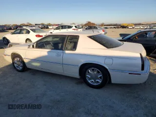2002 Cadillac Eldorado z VIN 1G6EL12Y12B100821, wystawiony jako Copart lot #83495214 z przebiegiem 36 358 mil mil oraz Czysty tytuł • Clean title. Historia ofert i sprzedaży dostępna na DreamBid. Obrazek 2.
