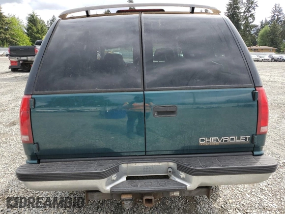 1998 Chevrolet Tahoe z VIN 1GNEK13R2WJ304666, wystawiony jako Copart lot #57833815 z przebiegiem 199 103 mil mil oraz Szkoda całkowita • Salvage title. Historia ofert i sprzedaży dostępna na DreamBid. Obrazek 6.