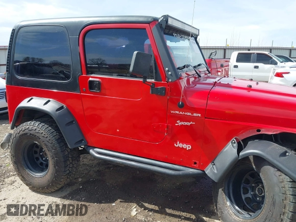 2002 Jeep Wrangler Sport with VIN 1J4FA49S42P771262, listed as a IAAI auction lot 41819403 with 132,871 mi miles. Bid and sale history available at carsss.com. Image 14.