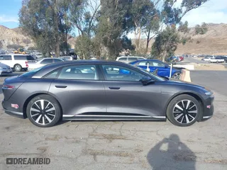 2024 Lucid Air Pure with VIN 50EA1PGA4RA004886, listed as a IAAI auction lot 41349451 with 4,165 mi miles. Bid and sale history available at carsss.com. Image 14.
