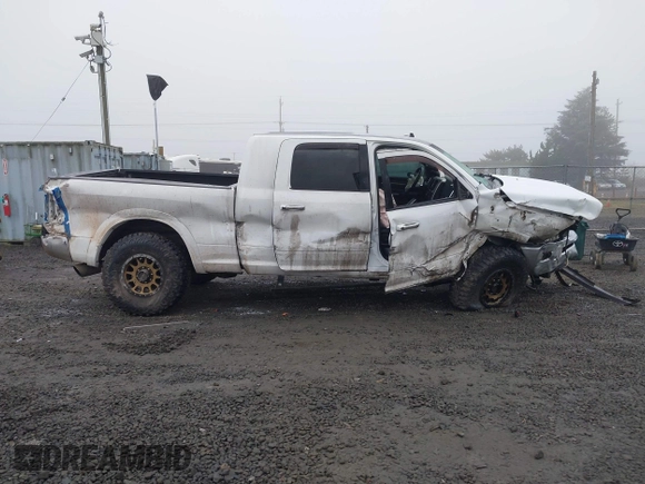 2016 Ram 2500 Laramie with VIN 3C6UR5NL2GG287071, listed as a IAAI auction lot 40989387 with 104,781 mi miles and . Bid and sale history available at DreamBid. Image 13.