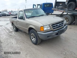 2003 Ford Ranger XL with VIN 1FTYR10U73PB00559, listed as a IAAI auction lot 41203236 with 192,029 mi miles. Bid and sale history available at carsss.com. Image 1.