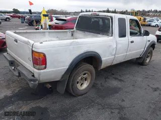 1999 Ford Ranger XLT with VIN 1FTZR15XXXTA09502, listed as a IAAI auction lot 41794904 with 203,276 mi miles. Bid and sale history available at carsss.com. Image 4.