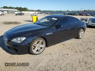 2014 BMW 6 Series 650i xDrive with VIN WBA6B4C55ED099057, listed as a Copart auction lot 71337764 with 30,246 mi miles and Salvage Title. Bid and sale history available at carsss.com. Image 1.