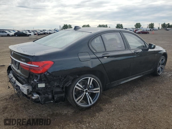 2019 BMW 7 Series 750i xDrive with VIN WBA7B0C53KG527537, listed as a Copart auction lot 64113345 with 36,820 mi miles and Salvage title. Bid and sale history available at DreamBid. Image 3.