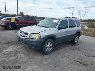 2006 Mazda Tribute i with VIN 4F2YZ02Z46KM27439, listed as a IAAI auction lot 41334237 with 209,309 mi miles. Bid and sale history available at carsss.com. Image 17.