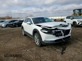 2021 Mazda CX-30 Preferred with VIN 3MVDMACL0MM216112, listed as a Copart auction lot 83617634 with 71,371 mi miles and Salvage Title. Bid and sale history available at DreamBid. Image 11.