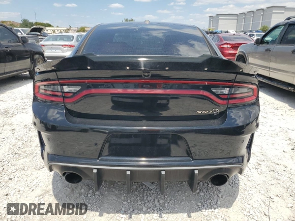 2021 Dodge Charger SRT Hellcat Widebody z VIN 2C3CDXL93MH660916, wystawiony jako Copart lot #51233805 z przebiegiem 27 729 mil mil oraz Czysty tytuł • Clean title. Historia ofert i sprzedaży dostępna na DreamBid. Obrazek 6.