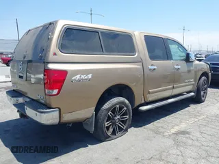 2005 Nissan Titan LE with VIN 1N6AA07B95N508001, listed as a IAAI auction lot 42656008 with 196,542 mi miles and . Bid and sale history available at DreamBid. Image 4.