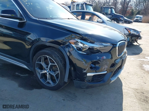 2019 BMW X1 xDrive28i with VIN WBXHT3C51K5L89758, listed as a IAAI auction lot 41535652 with 96,612 mi miles. Bid and sale history available at carsss.com. Image 6.