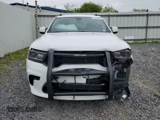 2021 Dodge Durango Special Service z VIN 1C4RDJFG4MC763486, wystawiony jako Copart lot #57222495 z przebiegiem 59 485 mil mil oraz Szkoda całkowita • Salvage title. Historia ofert i sprzedaży dostępna na DreamBid. Obrazek 5.
