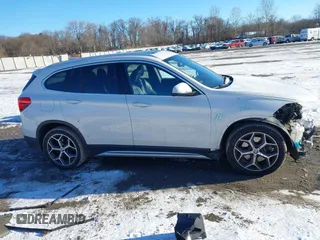 2018 BMW X1 xDrive28i z VIN WBXHT3C36J5L30217, wystawiony jako IAAI lot #41237775 z przebiegiem 60 071 mil mil oraz . Historia ofert i sprzedaży dostępna na DreamBid. Obrazek 13.