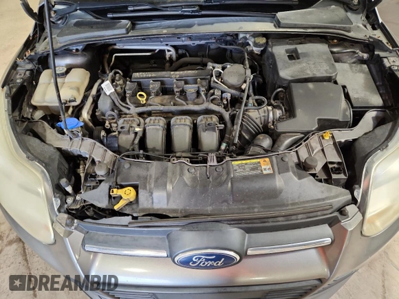 2012 Ford Focus SE with VIN 1FAHP3F28CL208855, listed as a Copart auction lot 63766165 with 168,183 mi miles and Salvage title. Bid and sale history available at DreamBid. Image 11.