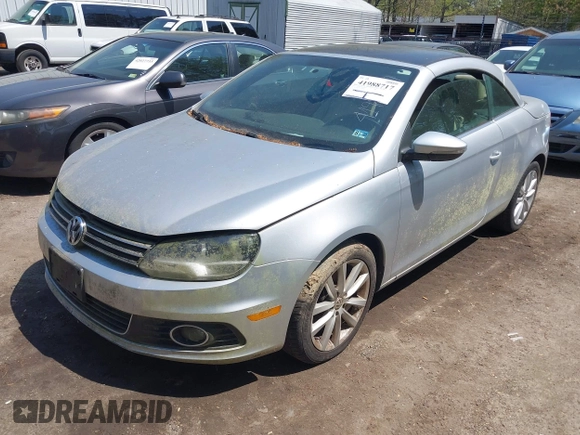2012 Volkswagen Eos Komfort with VIN WVWBW7AH8CV001621, listed as a IAAI auction lot 41988717 with 146,882 mi miles and . Bid and sale history available at DreamBid. Image 2.