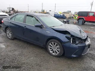 2015 Toyota Camry Hybrid LE with VIN 4T1BD1FK9FU162489, listed as a IAAI auction lot 41266557 with 66,311 mi miles. Bid and sale history available at carsss.com. Image 1.
