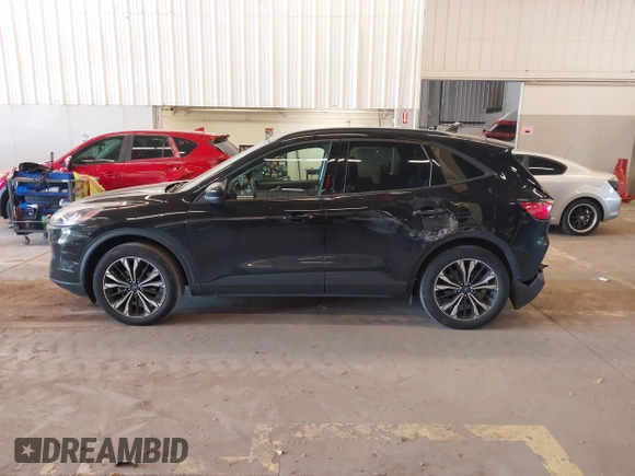 2021 Ford Escape SEL with VIN 1FMCU9H91MUA05128, listed as a IAAI auction lot 42073118 with 57,373 mi miles and . Bid and sale history available at DreamBid. Image 14.