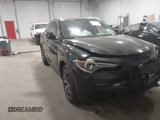 2020 Alfa Romeo Stelvio Ti z VIN ZASPAKBN5L7C91663, wystawiony jako IAAI lot #41816765 z przebiegiem 40 972 mil mil oraz . Historia ofert i sprzedaży dostępna na DreamBid. Obrazek 6.