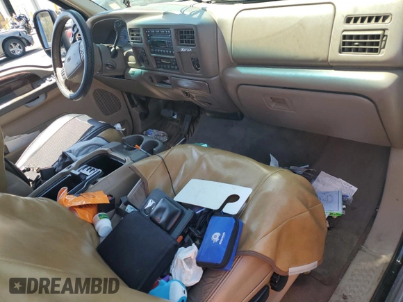 2002 Ford Excursion Limited z VIN 1FMNU43S92EC53835, wystawiony jako Copart lot #60525215 z przebiegiem 207 011 mil mil oraz Szkoda całkowita • Salvage title. Historia ofert i sprzedaży dostępna na DreamBid. Obrazek 8.