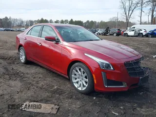 2014 Cadillac CTS Luxury AWD with VIN 1G6AX5S38E0146872, listed as a IAAI auction lot 41663642 with 56,787 mi miles and . Bid and sale history available at DreamBid. Image 1.