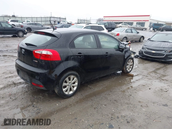 2012 Kia Rio EX with VIN KNADN5A39C6013756, listed as a IAAI auction lot 41560330 with 157,365 mi miles. Bid and sale history available at carsss.com. Image 4.