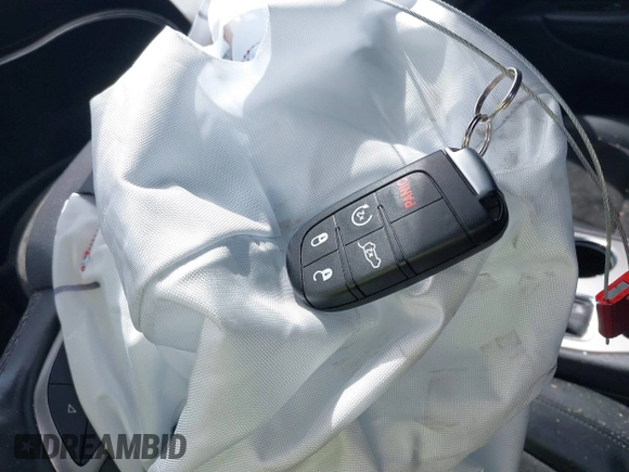 2021 Jeep Grand Cherokee Laredo E with VIN 1C4RJFAG7MC620710, listed as a IAAI auction lot 42255694 with 51,989 mi miles and . Bid and sale history available at DreamBid. Image 11.