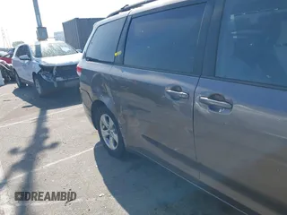 2014 Toyota Sienna LE AAS with VIN 5TDKK3DC6ES521706, listed as a IAAI auction lot 41999188 with 104,867 mi miles. Bid and sale history available at carsss.com. Image 6.
