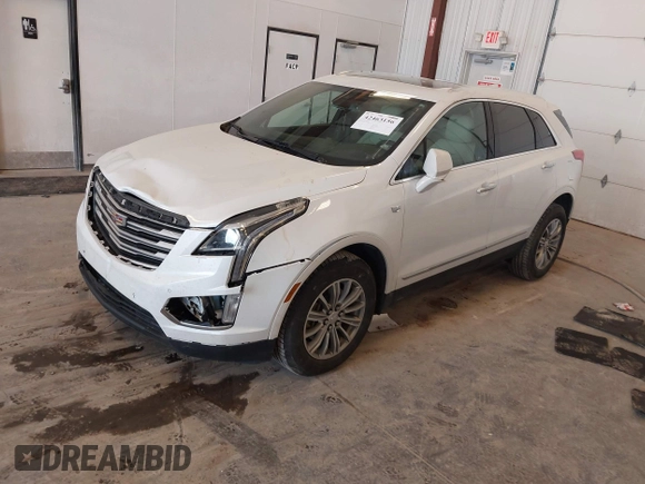 2018 Cadillac XT5 Luxury AWD z VIN 1GYKNDRS9JZ248969, wystawiony jako IAAI lot #42463156 z przebiegiem 90 271 mil mil oraz . Historia ofert i sprzedaży dostępna na DreamBid. Obrazek 2.