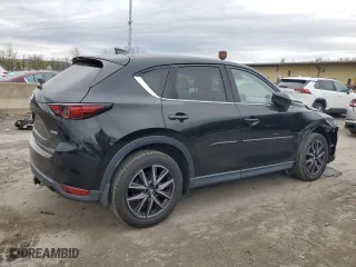 2017 Mazda CX-5 Grand Touring with VIN JM3KFBDL7H0204658, listed as a Copart auction lot 54007165 with 154,546 mi miles and Salvage Title. Bid and sale history available at carsss.com. Image 3.