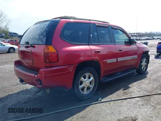 2005 GMC Envoy SLE with VIN 1GKDT13S252127604, listed as a IAAI auction lot 41898390 with 210,655 mi miles. Bid and sale history available at carsss.com. Image 4.