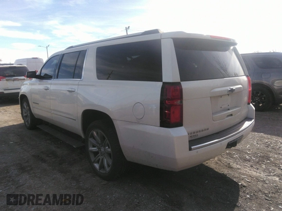 2015 Chevrolet Suburban LTZ with VIN 1GNSKKKC0FR551031, listed as a IAAI auction lot 40694559 with 184,261 mi miles. Bid and sale history available at carsss.com. Image 3.