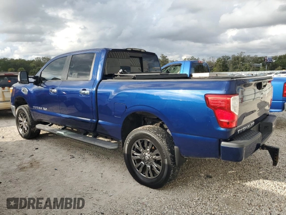 2017 Nissan Titan SL z VIN 1N6BA1F25HN514572, wystawiony jako Copart lot #85803054 z przebiegiem 79 904 mil mil oraz Czysty tytuł • Clean title. Historia ofert i sprzedaży dostępna na DreamBid. Obrazek 2.
